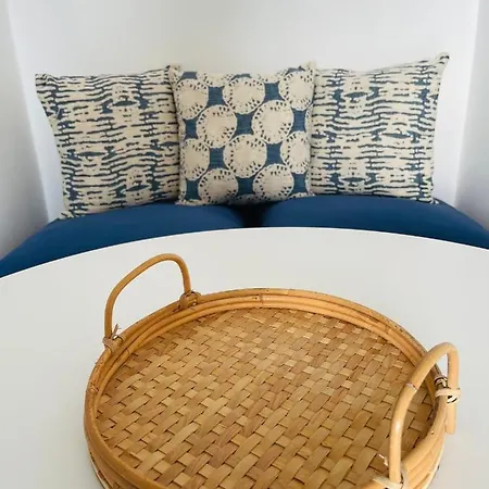 Mykonian Starling - Town N' Sunset View