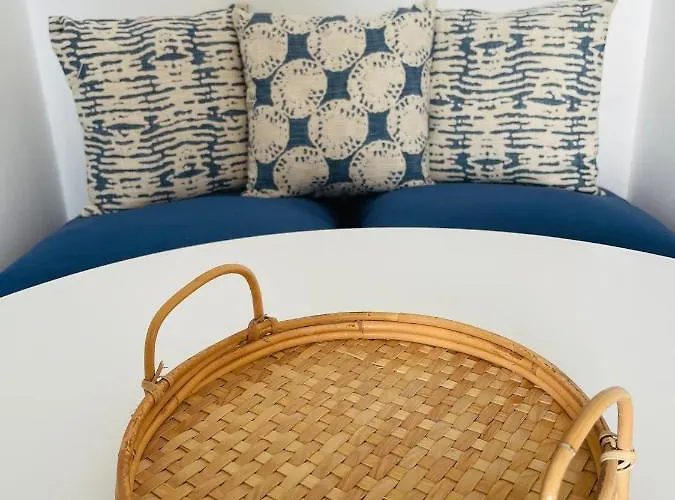 Mykonian Starling - Town N' Sunset View